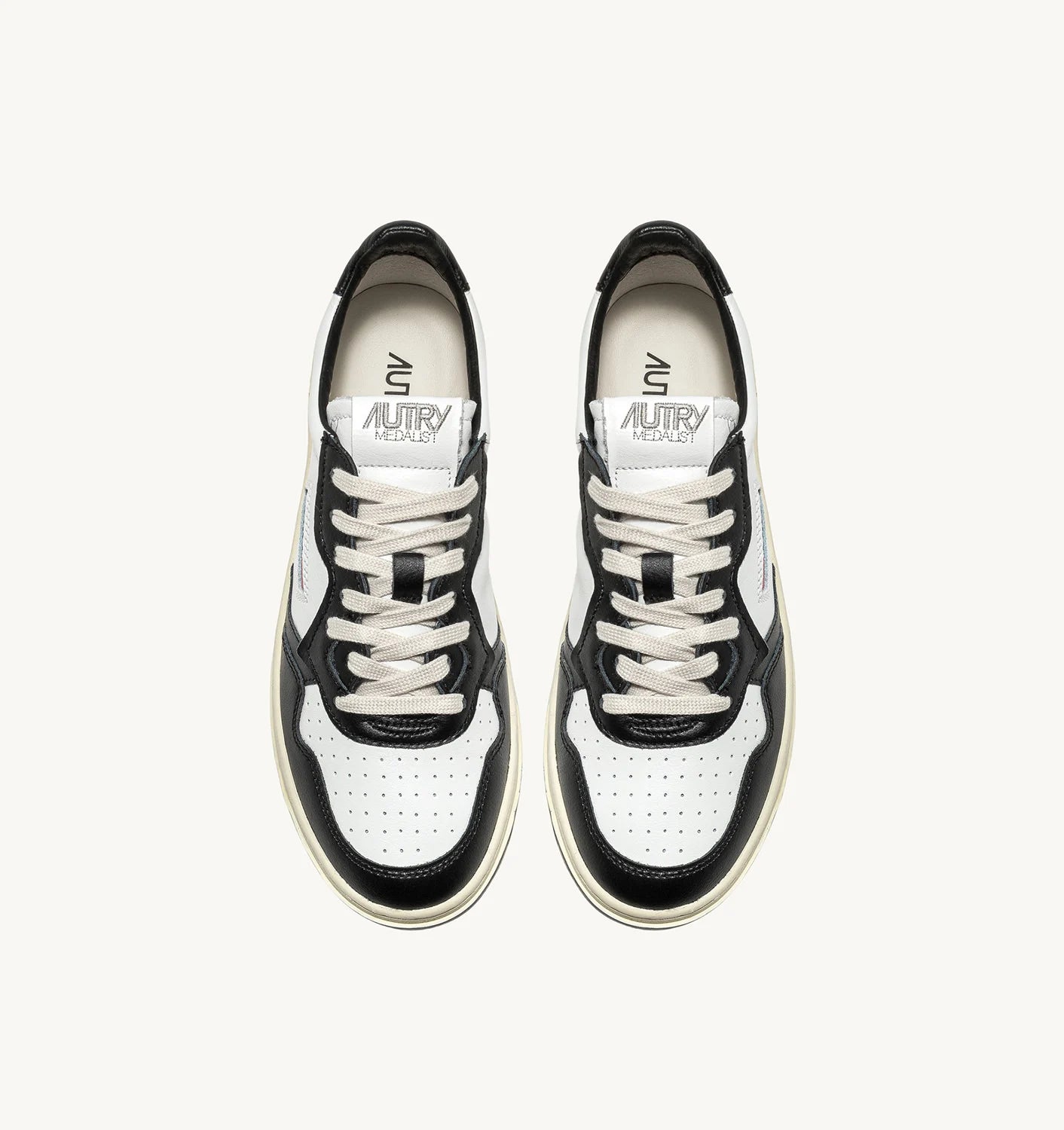 AUTRY SNEAKERS MEDALIST LOW BICOLOR IN PELLE BIANCA E NERA