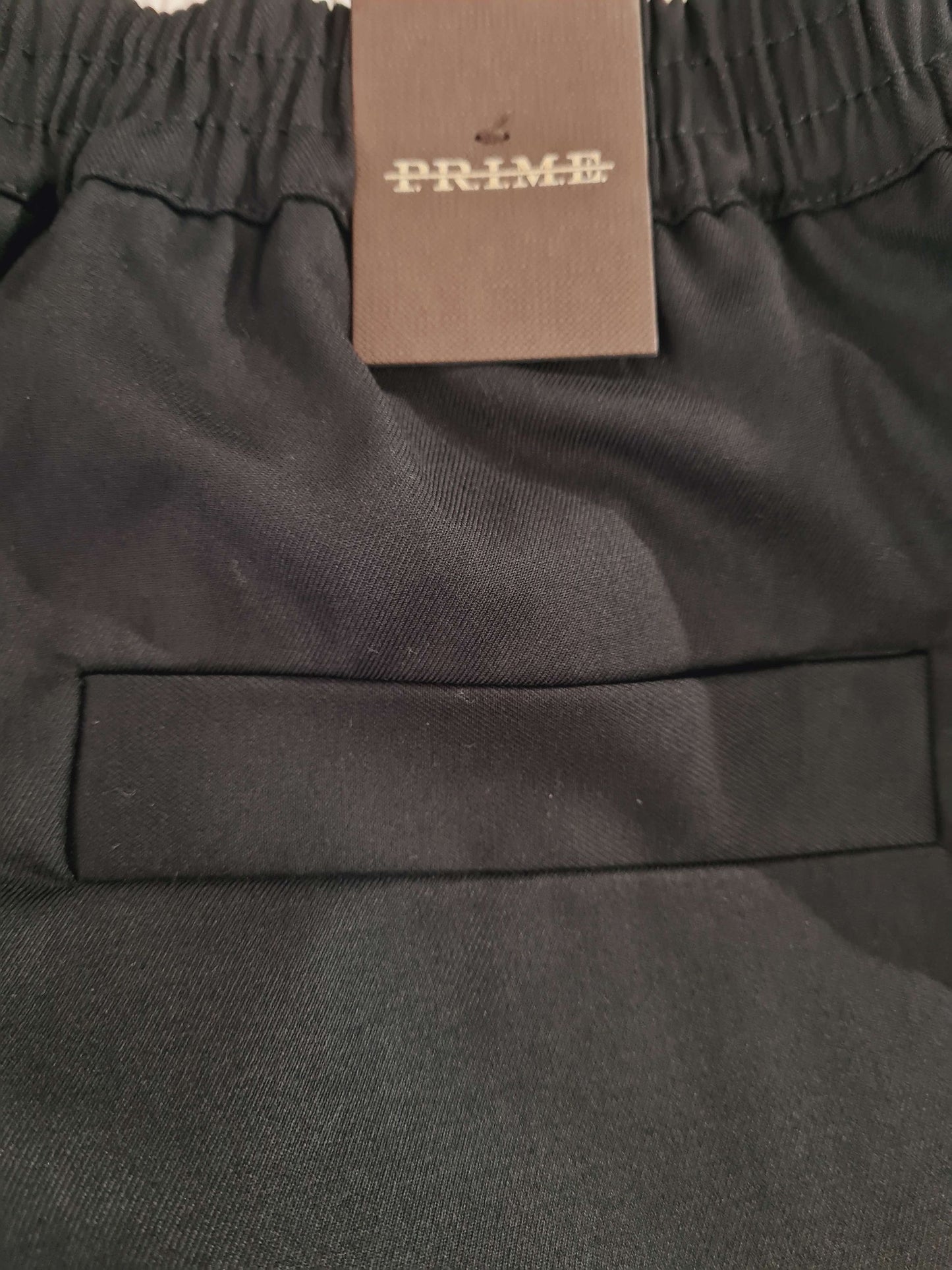 PANTALONE CON ELASTICO VESTIBILITA LARGA